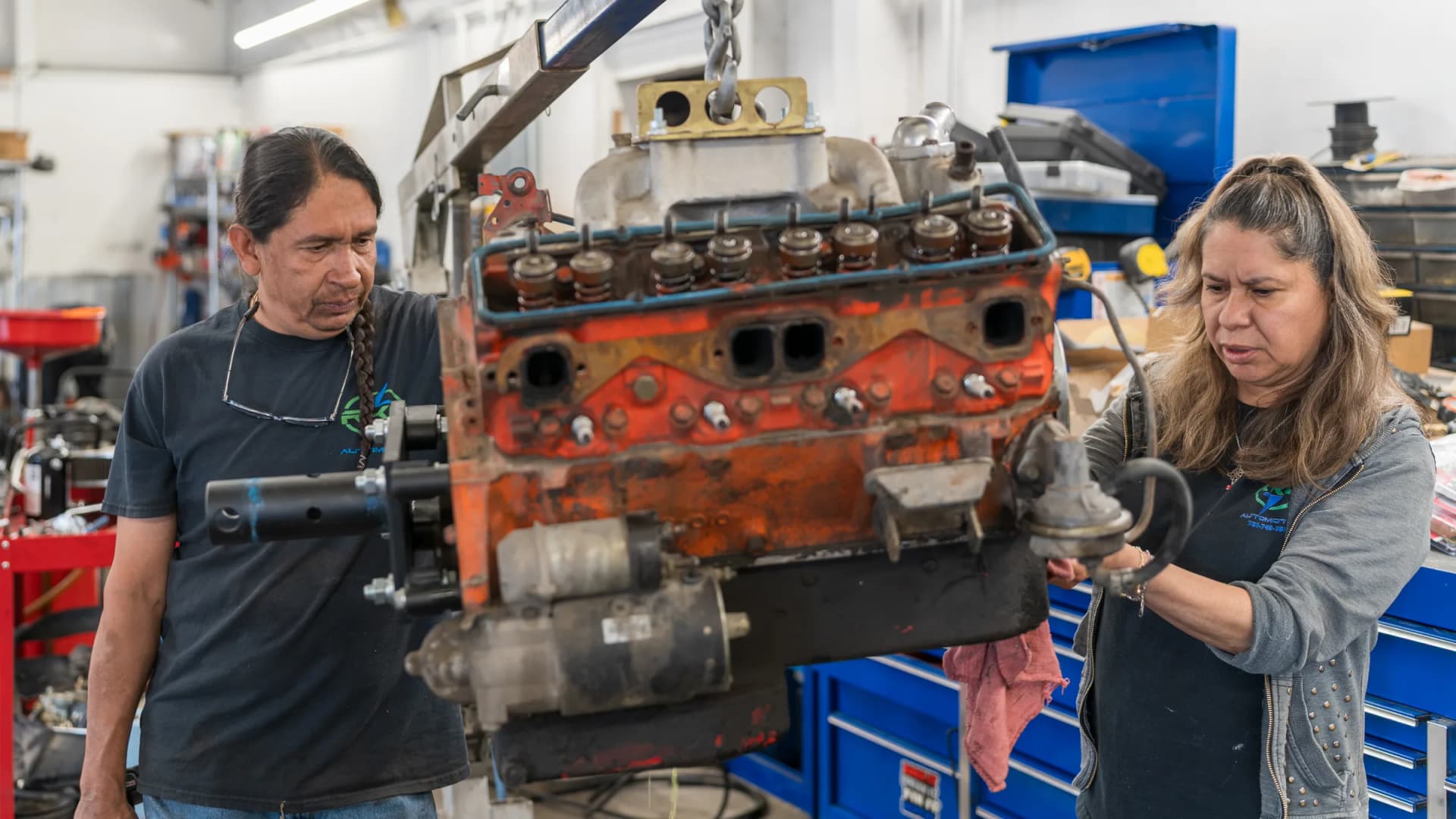 ASE-certified technicians rebuilding an engine at RKC Automotive in Englewood, CO